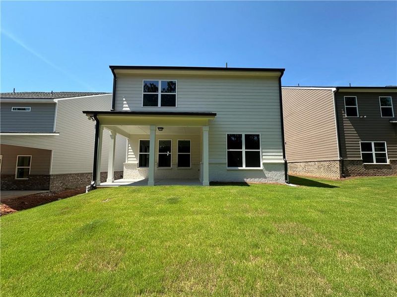 Exterior details and patio area of a home in Kentmere, Auburn (Image 30).