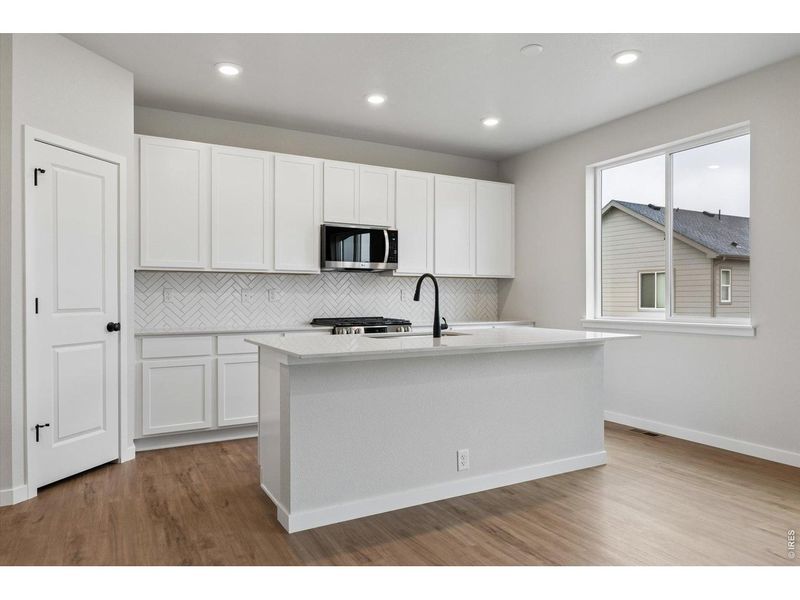 Furnished interior view inside a new home in Prairie Song, Windsor (Image 8).