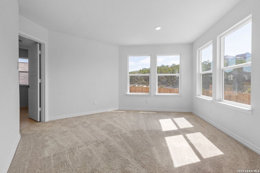 Spacious, unfurnished interior of a new home in Hidden Bluffs at TRP, San Antonio (Image 15).