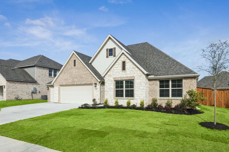 Front exterior of a new home in Dove Hollow, Waxahachie, TX, highlighting curb appeal (Image 2). Front exterior of a new home in Dove Hollow, Waxahachie, TX, highlighting curb appeal (Image 2).