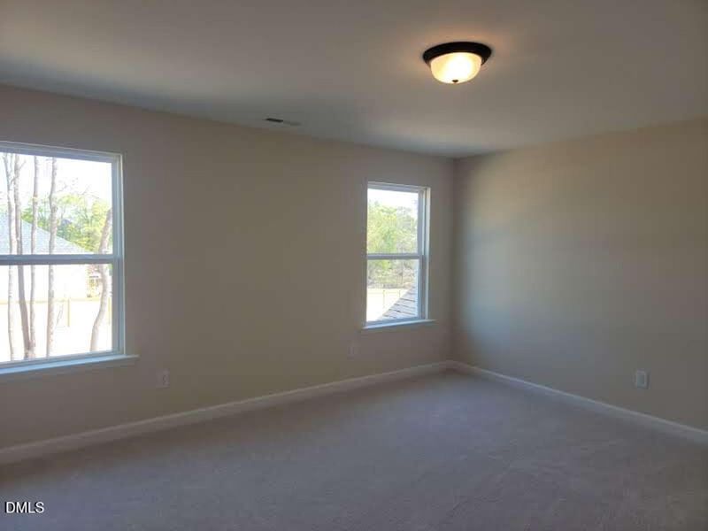 Spacious, unfurnished interior of a new home in Tobacco Road, Angier (Image 30).