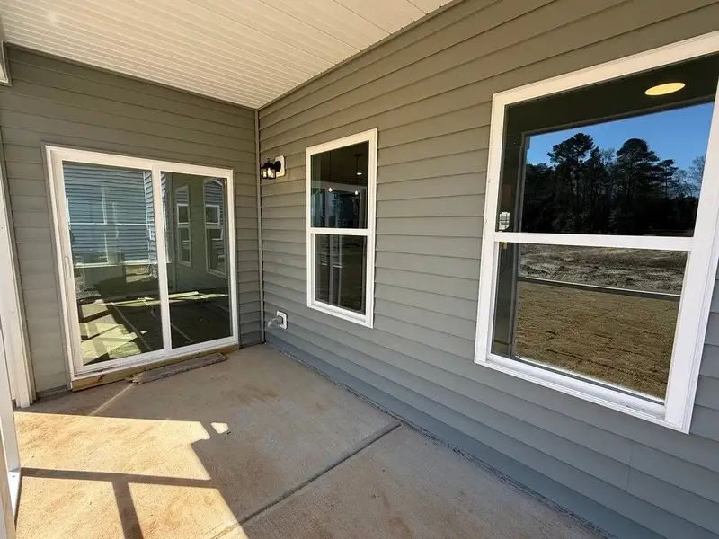 Exterior details and patio area of a home in The Point, Rolesville (Image 3). Exterior details and patio area of a home in The Point, Rolesville (Image 3).