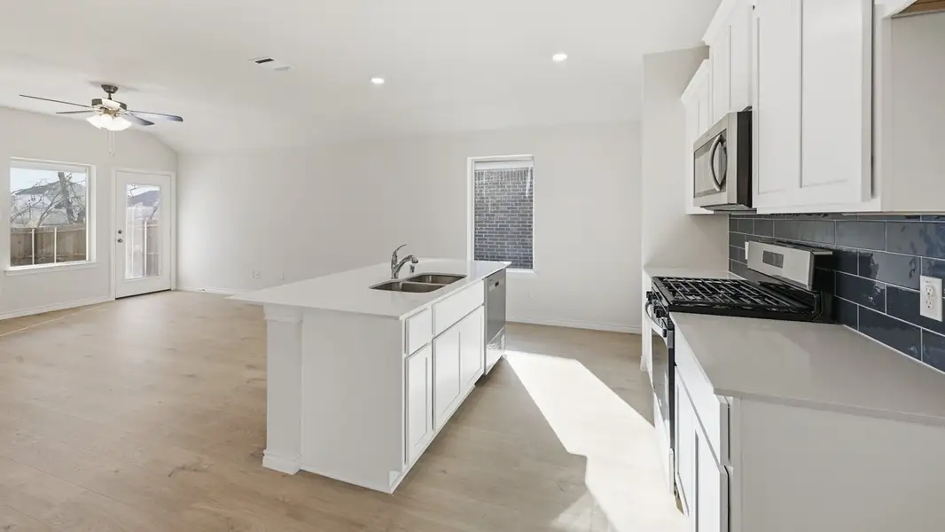 Representative furnished interior of a home built from the Orion by D.R. Horton in Winchester Crossing, Princeton (Image 4).