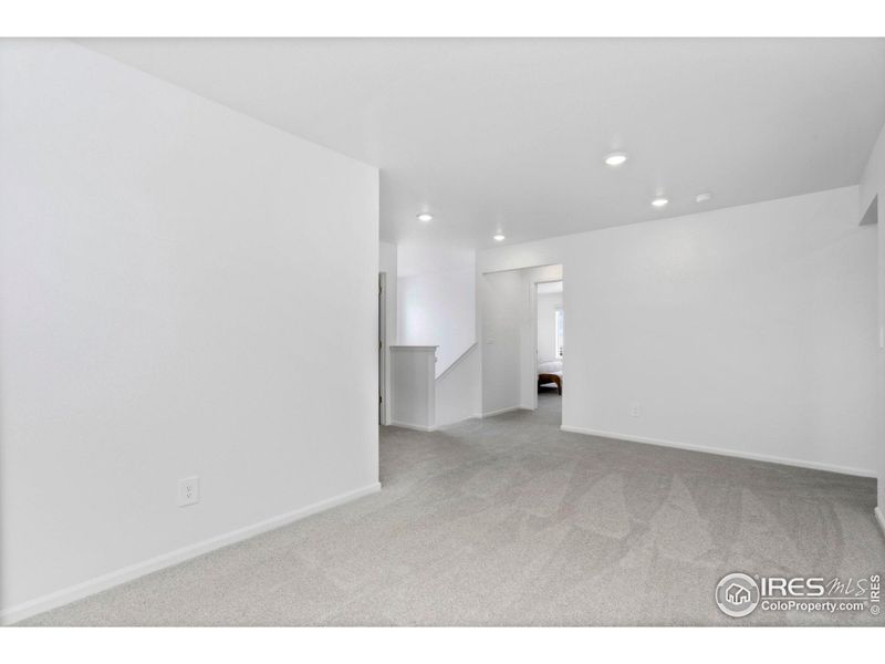 Loft area looking into primary bedroom