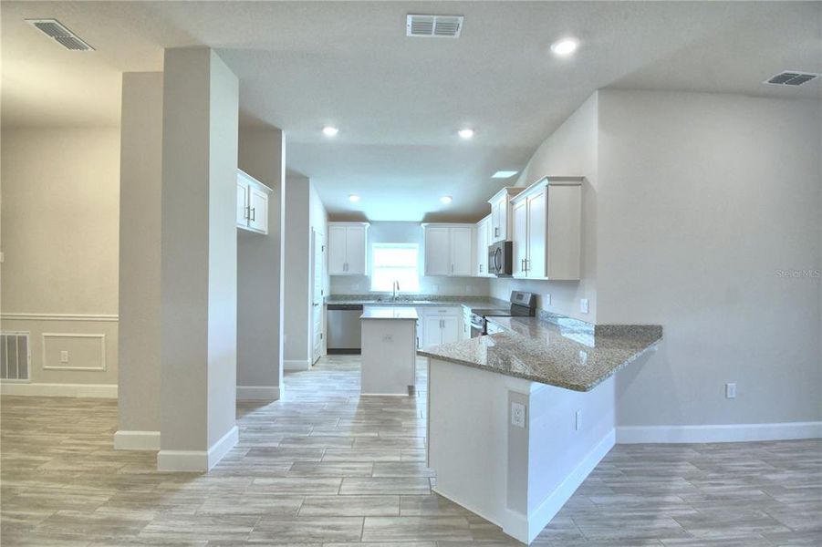 Furnished interior view inside a new home in , Auburndale (Image 13).