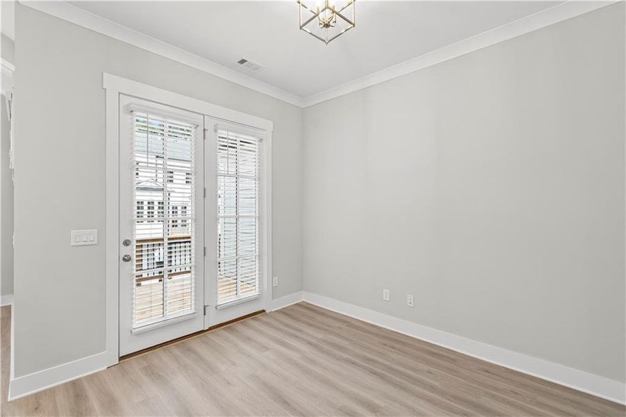 Spacious, unfurnished interior of a new home in Devin's Shire - A Kennesaw Tradition, Kennesaw (Image 27).