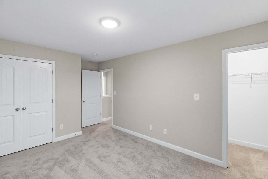 Representative unfurnished interior of a home built from the Aberdeen by Caviness & Cates Communities in Bartlett Manor, Youngsville (Image 196).