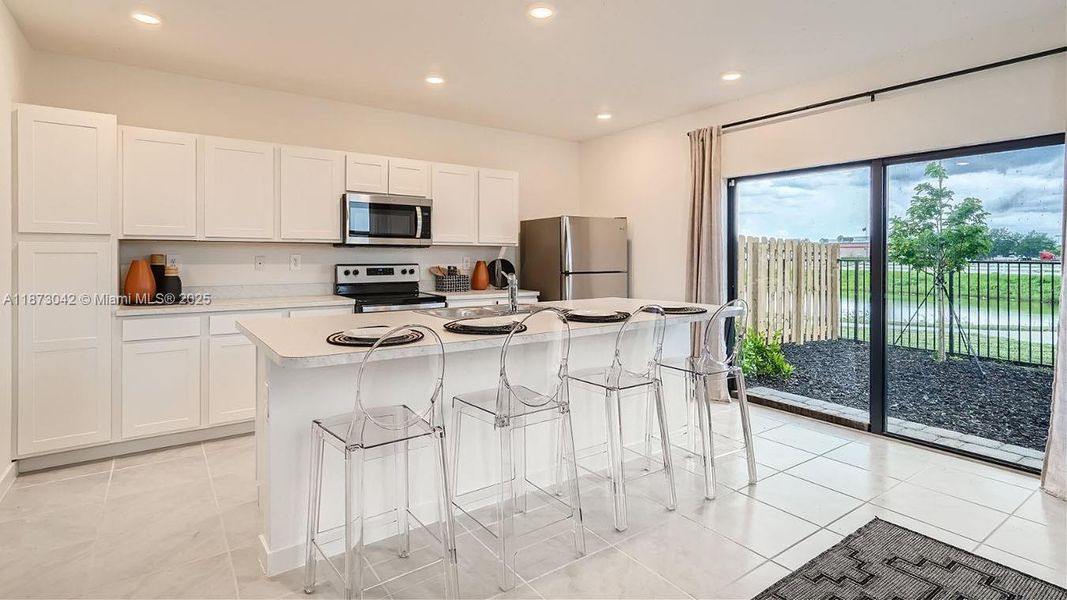 Furnished interior view inside a new home in Palm Cay, Florida City (Image 7).