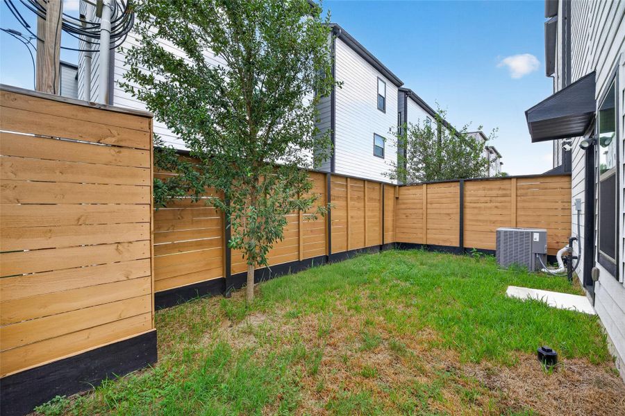 Exterior details and patio area of a home in , Houston (Image 33).