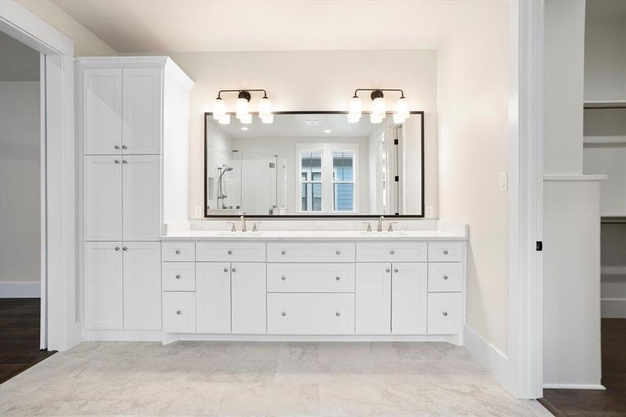 Bathroom featuring vanity, hardwood / wood-style flooring, and walk in shower