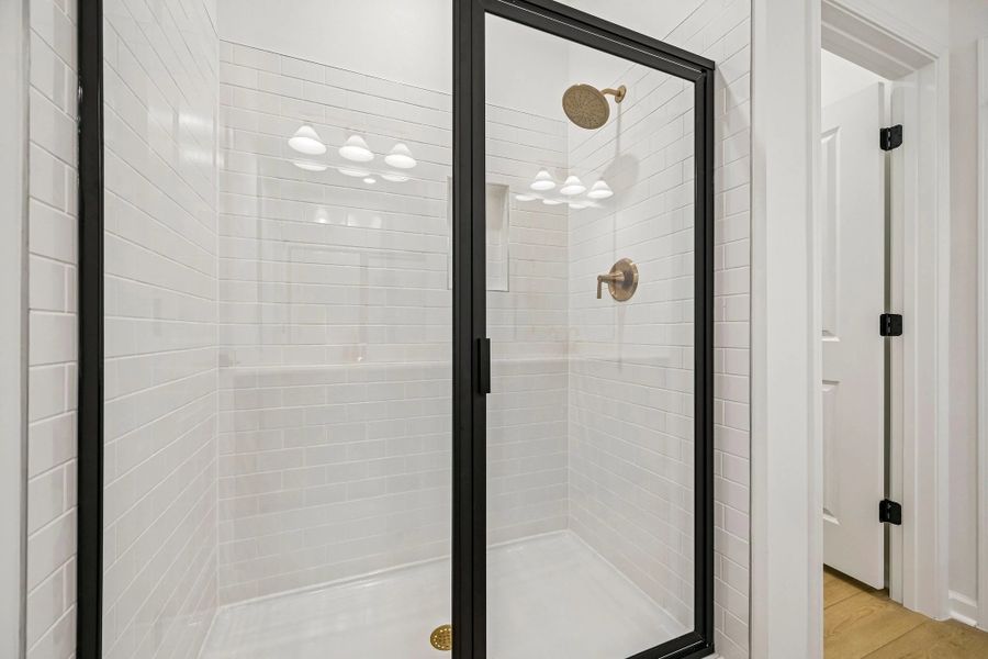 Primary Bath featuring the AW Collection® Sapphire - Clean white and cool hues define the space. Primary Bath featuring the AW Collection® Sapphire - Clean white and cool hues define the space.