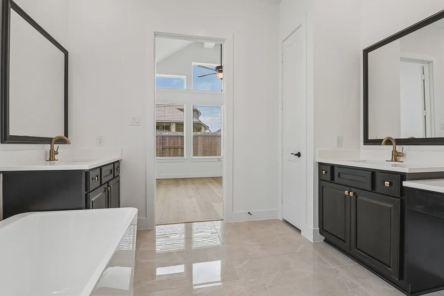 Furnished interior view inside a new home in Parkside on the River, Georgetown (Image 12).