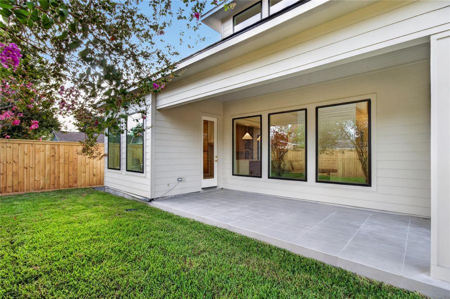 Extend your living outdoors beneath the covered patio, creating the perfect space for year-round dining, entertaining, or relaxing. Extend your living outdoors beneath the covered patio, creating the perfect space for year-round dining, entertaining, or relaxing.