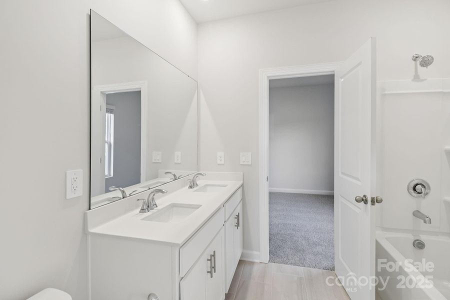 Photo is not of the actual home, but is an inspirational photo of builder’s model home and may depict options, furnishings, and/or decorator features that are not included