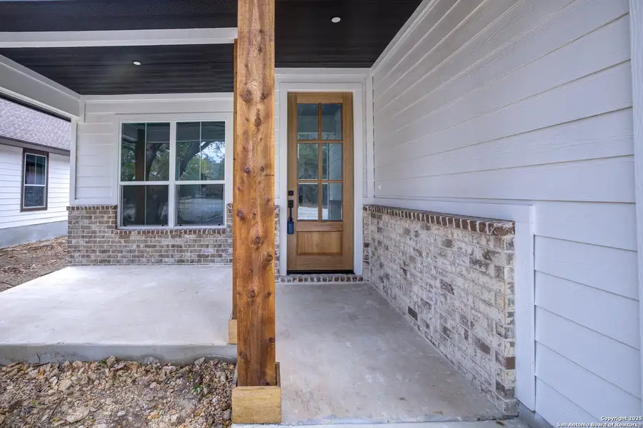 Exterior details and patio area of a home in , Wimberley (Image 4).