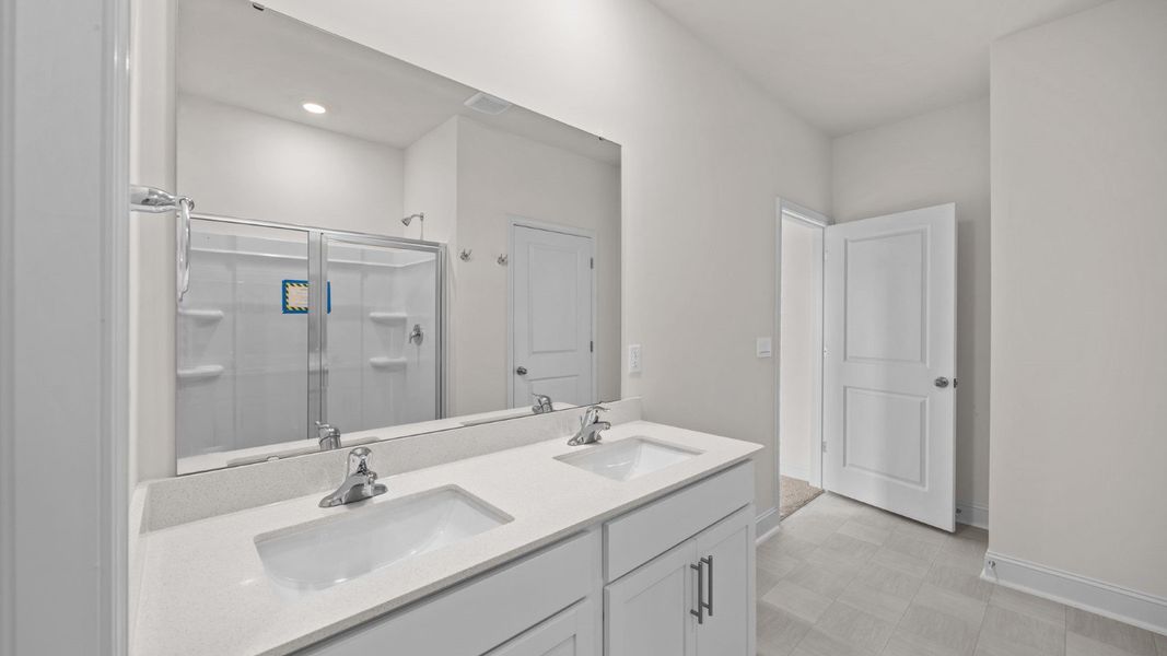 Furnished interior view inside a new home in Beaver Dam Crossing, Bailey (Image 9).