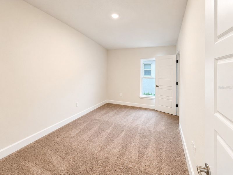Spacious, unfurnished interior of a new home in Harmony Central, St. Cloud (Image 14).