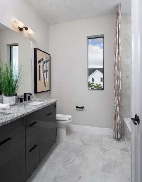 Representative furnished interior of a home built from the Marguerite by Mattamy Homes in Newfield, Palm City (Image 12).