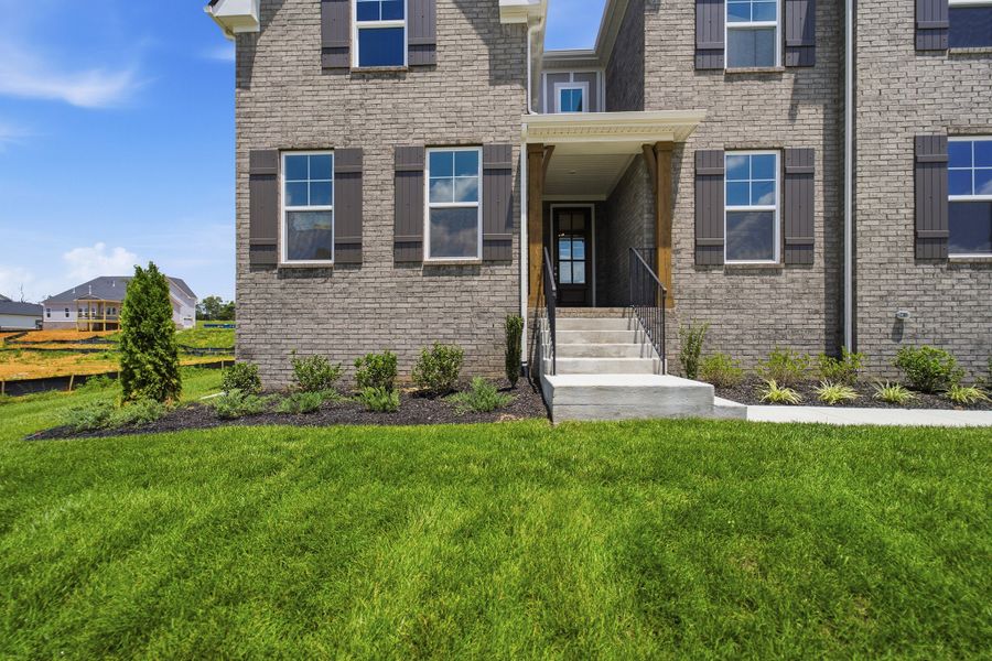 Exterior details and patio area of a home in Aden Woods, Fairview (Image 3).