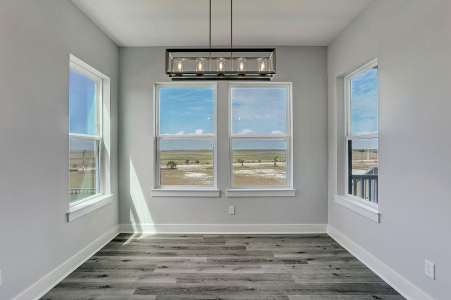 Dining room space offers excellent canal & wetlands views. Dining room space offers excellent canal & wetlands views.