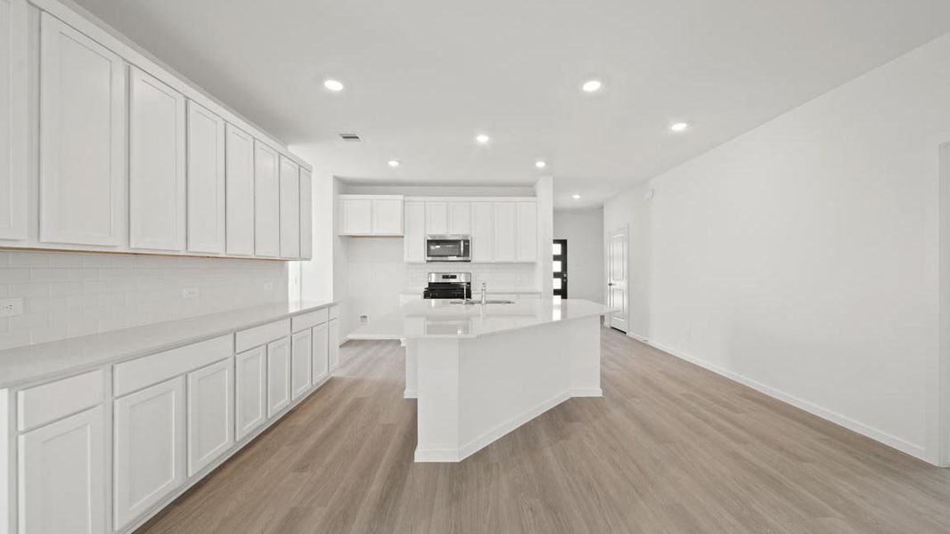 Furnished interior view inside a new home in Sunterra Lakes, Brookshire (Image 10).