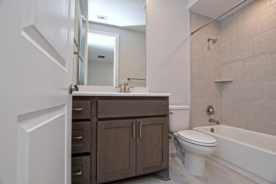Representative furnished interior of a home built from the Sapphire by Giddens Homes in Riverstone, Georgetown (Image 14).