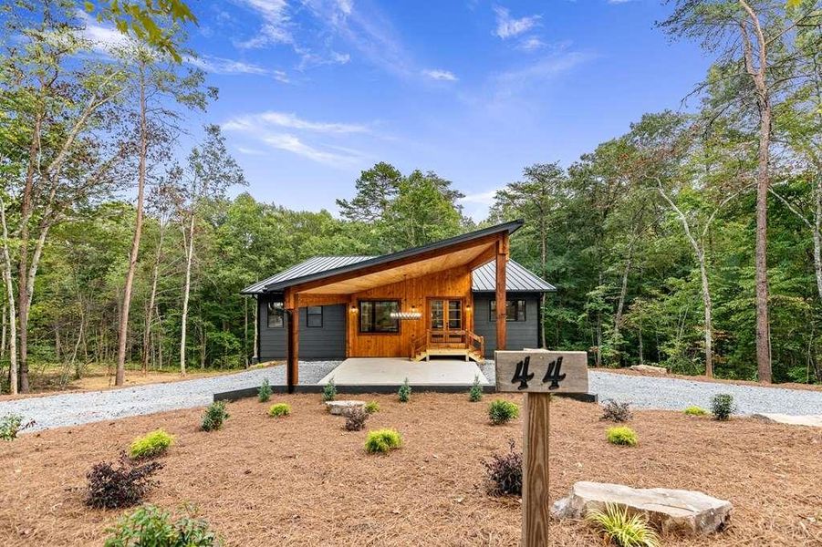 Front exterior of a new home in , McCaysville, GA, highlighting curb appeal (Image 24).
