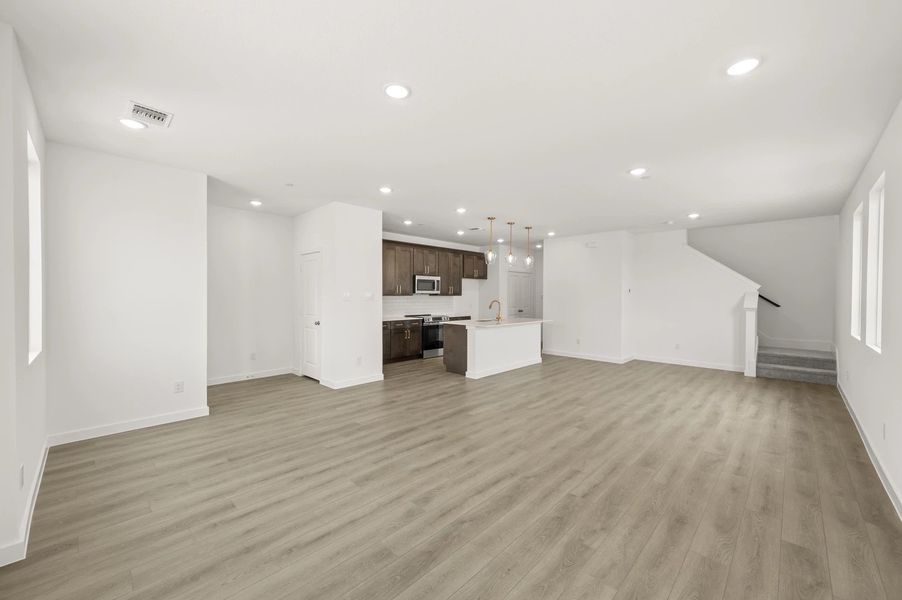 Open Kitchen-Living-Dining Room featuring the Oxford Collection