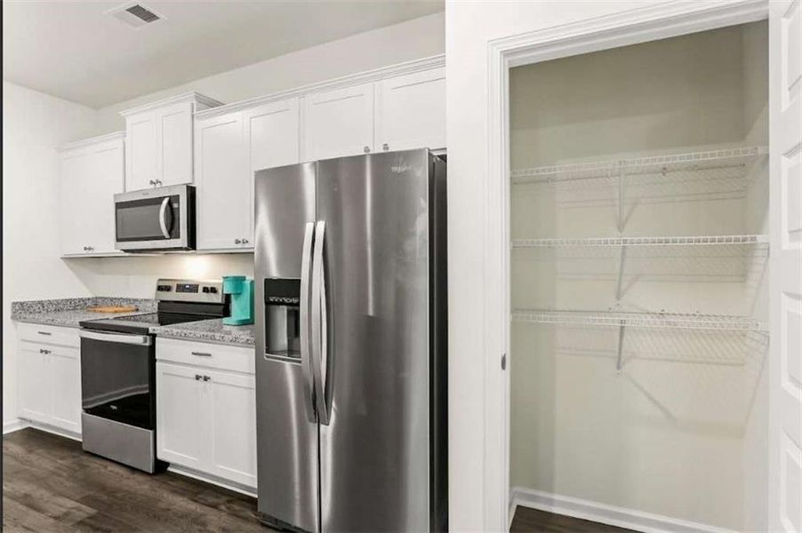Furnished interior view inside a new home in The Villages at Oakshire, Atlanta (Image 12).