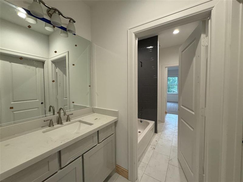 Jack and Jill Bathroom upstairs between bedrooms 3 and 4  (Construction Photo 7-18-24)