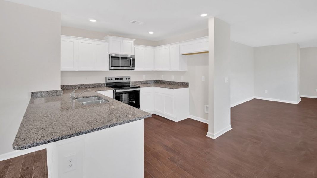 Representative furnished interior of a home built from the Allex by D.R. Horton in Clearwater Springs, Johnson City (Image 5). Representative furnished interior of a home built from the Allex by D.R. Horton in Clearwater Springs, Johnson City (Image 5).