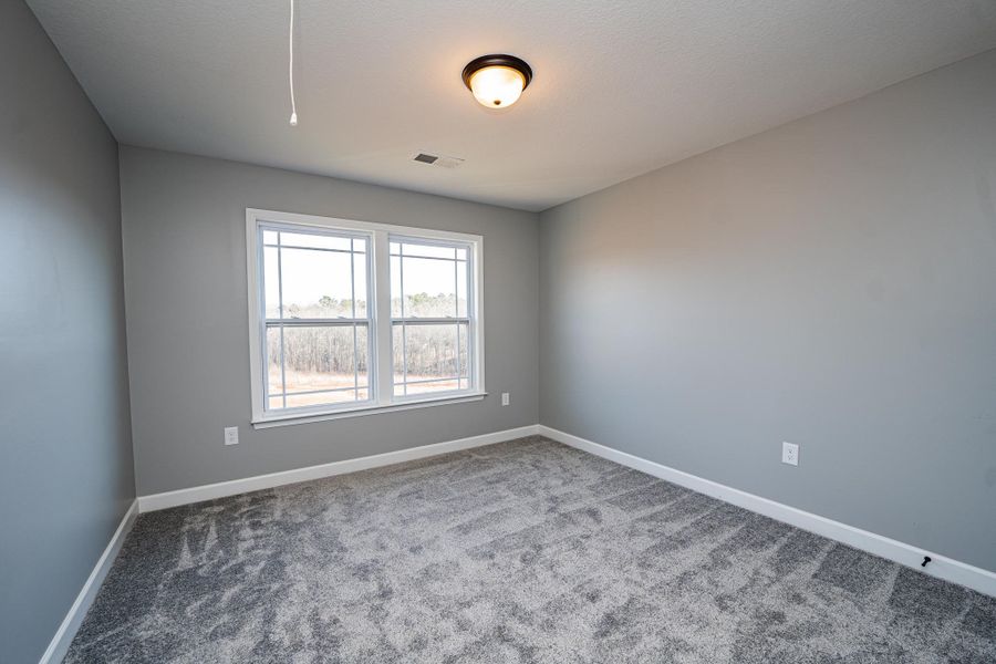 Representative unfurnished interior of a home built from the Sumter by Enchanted Homes in Lonesome Dove, San Antonio (Image 48).