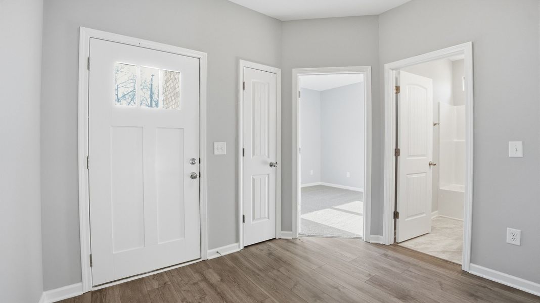 foyer. Craftsman style front door.