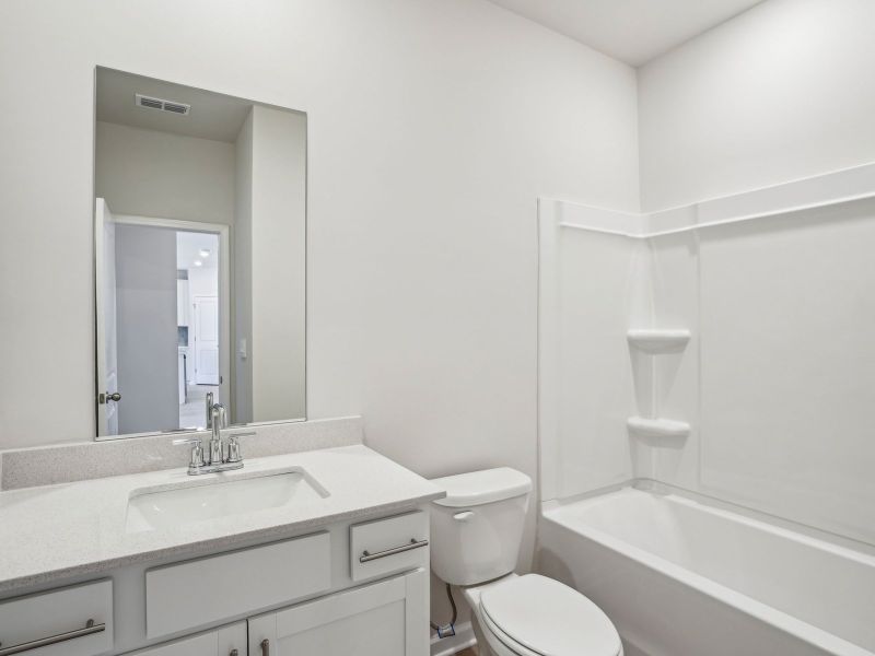 Furnished interior view inside a new home in Parkside at Grayson, Grayson (Image 7).