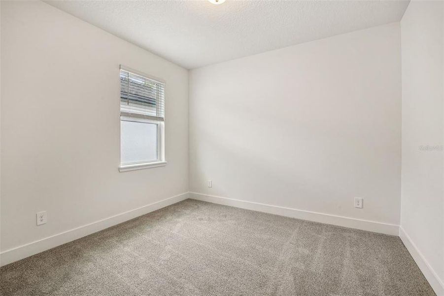 Spacious, unfurnished interior of a new home in Legends Preserve - Signature Series, Daytona Beach (Image 28).