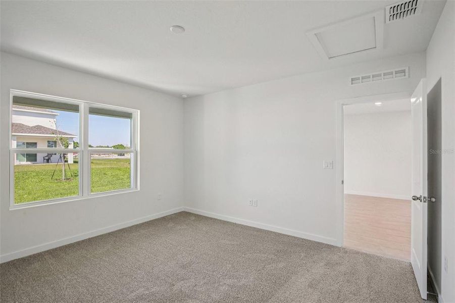 Spacious, unfurnished interior of a new home in Willowbrook North, Winter Haven (Image 23).