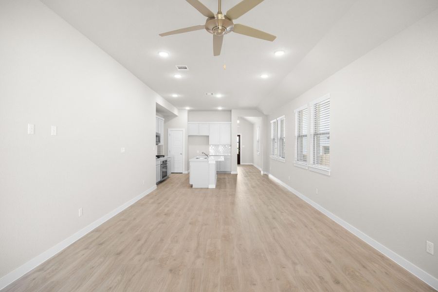 Living Room in the Elm home plan by Trophy Signature Homes – REPRESENTATIVE PHOTO Living Room in the Elm home plan by Trophy Signature Homes – REPRESENTATIVE PHOTO