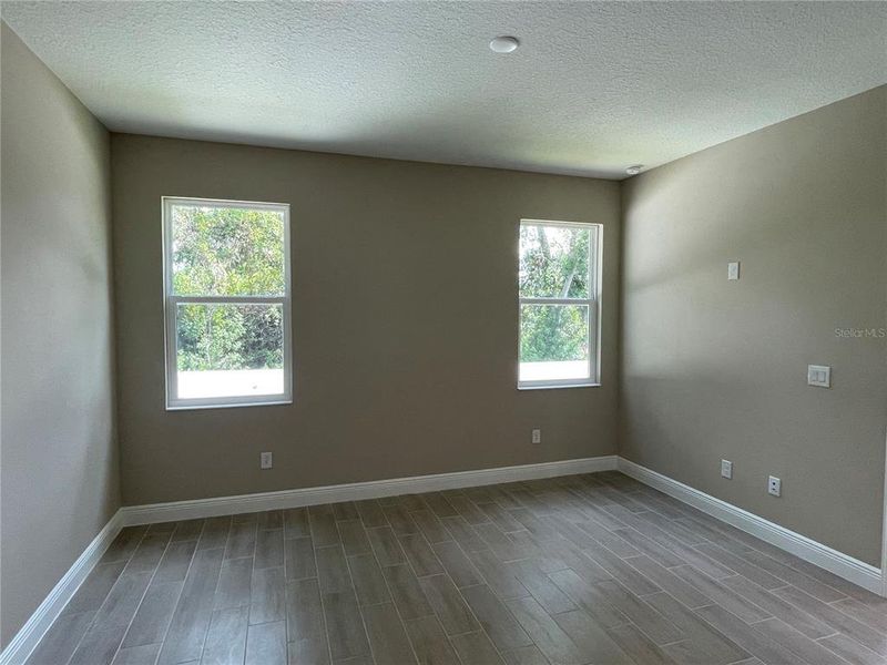 Spacious, unfurnished interior of a new home in Fairway Pointe - 55+ Villa Community, Sun City Center (Image 9).