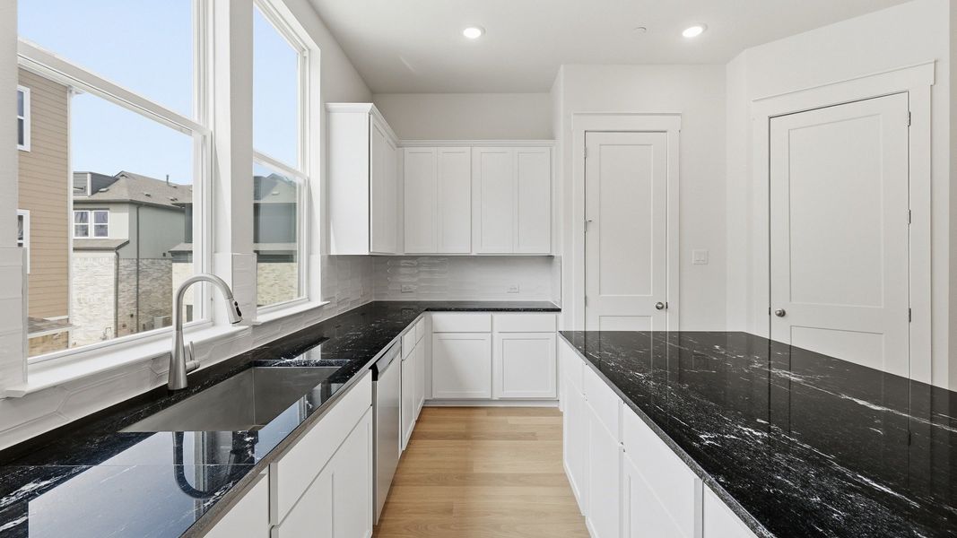 Furnished interior view inside a new home in Collin Creek, Plano (Image 28).