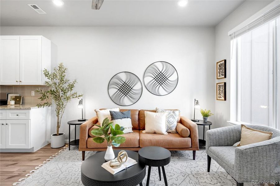 The main level living room is open to the kitchen