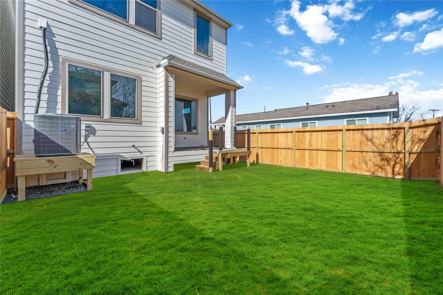 Exterior details and patio area of a home in , Houston (Image 3). Exterior details and patio area of a home in , Houston (Image 3).