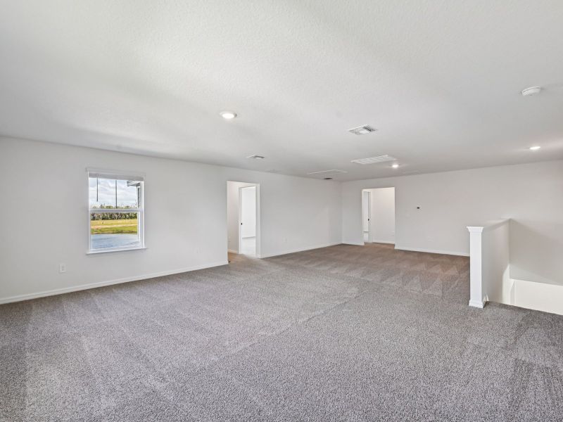 Spacious, unfurnished interior of a new home in Oakfield Trails - Signature Series, Parrish (Image 13).