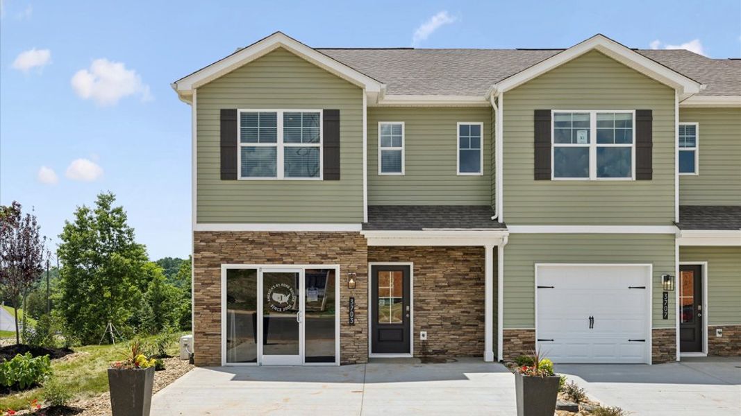 Representative exterior photo of a completed home built from the Altamont Townhome by D.R. Horton in Saint Marc's, Powell, TN (Image 2).