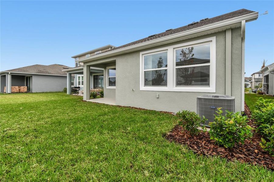 Exterior details and patio area of a home in Chapel Crossings, Wesley Chapel (Image 24).
