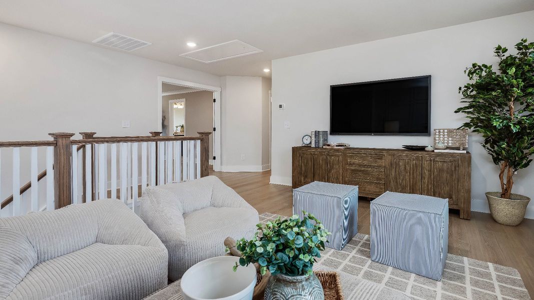 Representative furnished interior of a home built from the Stonefield by DRB Homes in Weavers Pointe, Zebulon (Image 41).