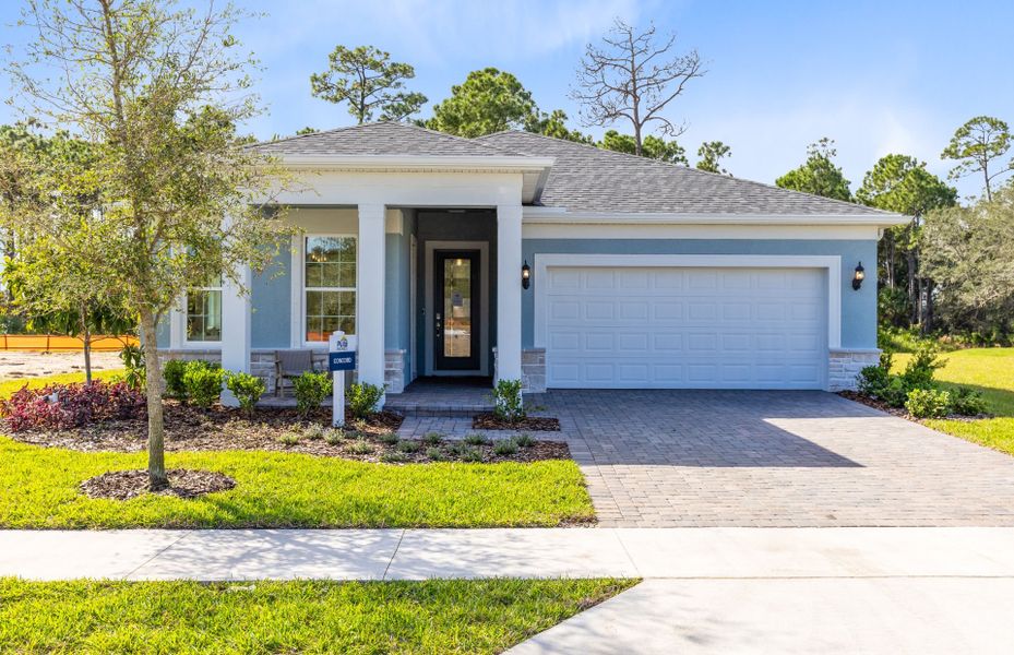 Front exterior of a new home in Waterstone at Halifax Plantation, Ormond Beach, FL, highlighting curb appeal (Image 1). Front exterior of a new home in Waterstone at Halifax Plantation, Ormond Beach, FL, highlighting curb appeal (Image 1).