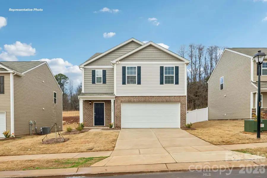 Front exterior of a new home in Zion Springs, Hickory, NC, highlighting curb appeal (Image 1). Front exterior of a new home in Zion Springs, Hickory, NC, highlighting curb appeal (Image 1).