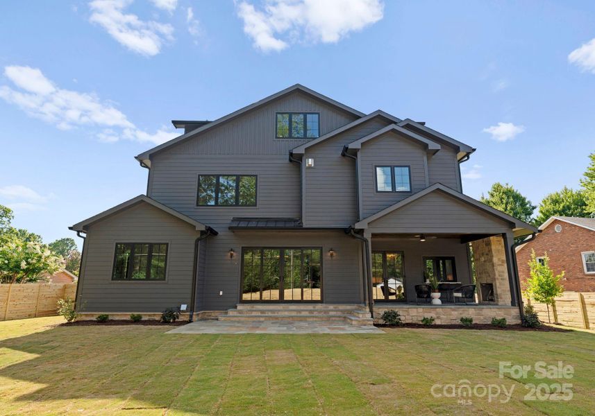 The home offers black casement windows throughout, the back of the home opens to multiple outdoor living areas and a large level backyard; private & elevated lot. The home offers black casement windows throughout, the back of the home opens to multiple outdoor living areas and a large level backyard; private & elevated lot.