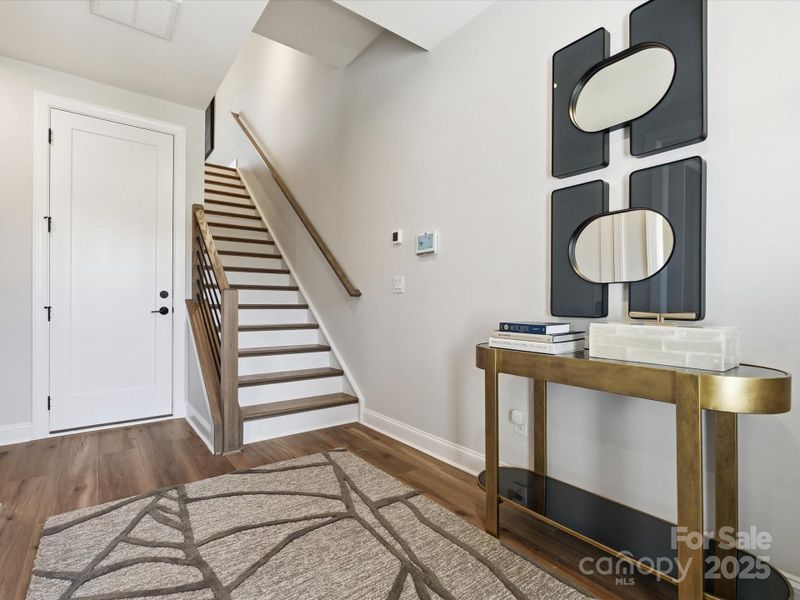 Oak Box Stairs and Open Rail Lead to Second Floor. *Model Photos | Actual Finishes, Structural Selections, and Orientation May Vary.