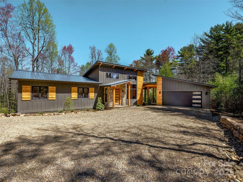 Front exterior of a new home in , Brevard, NC, highlighting curb appeal (Image 22).